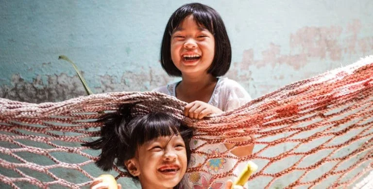 Smiling healthy children in Asia.